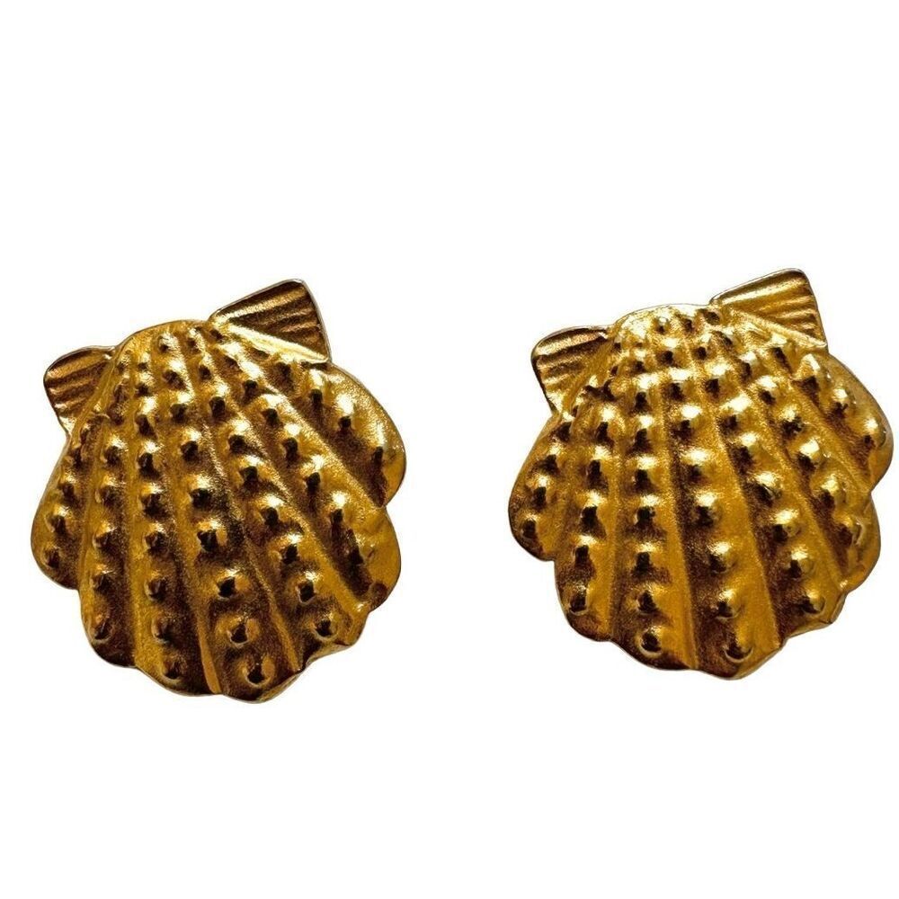 Gold tone Diane von Furstenberg vintage seashell clip on earrings.